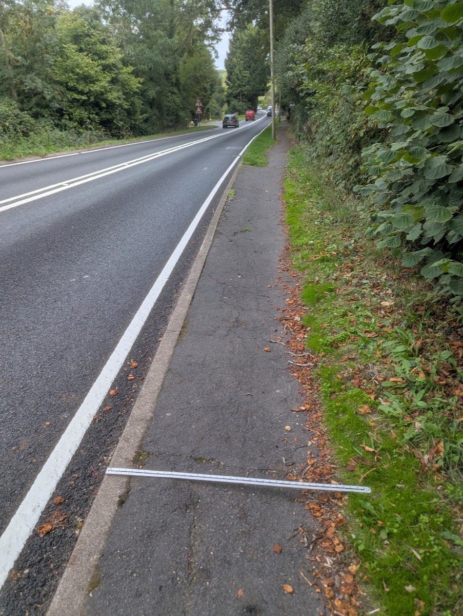 Rule across the footway with a car passing